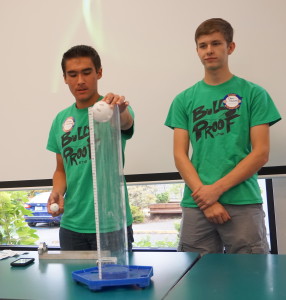 Brandon and Drew explain how their robot will pick up the ball and put it in the cylinder 090215