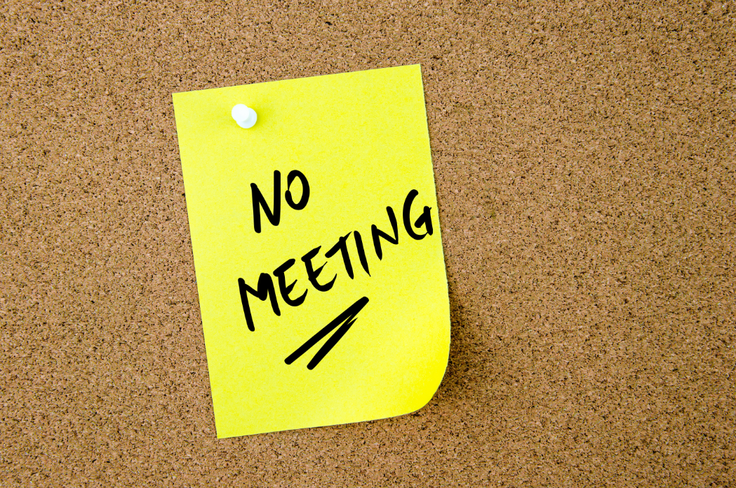 Post it with "No Meeting" written on it